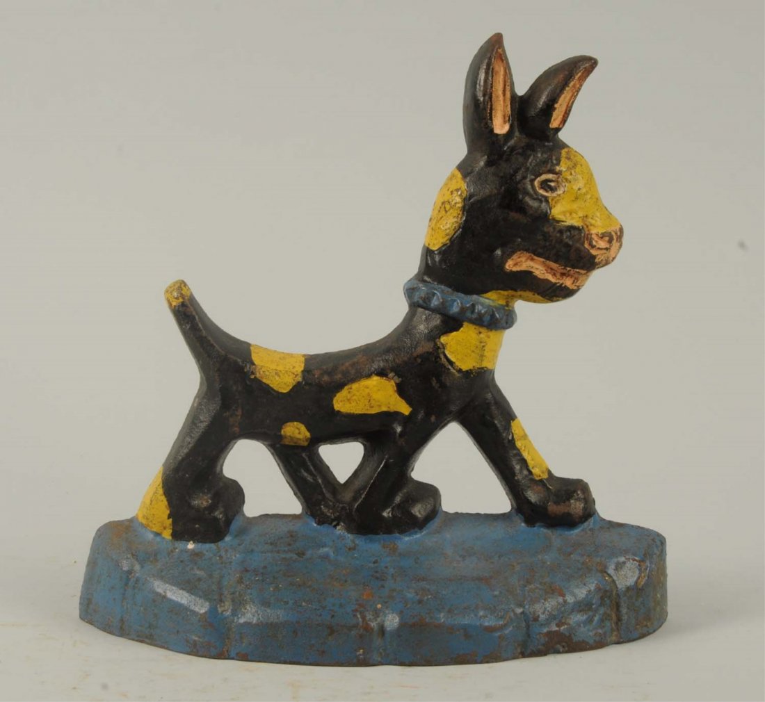 Cast Iron Deco Style Walking Dog Doorstop.: “Taylor Cook, 1930”. Delightfully stylized whimsical walking dog painted in eye catching deco colors. Condition (Excellent). Size 7 - 1/4" T.