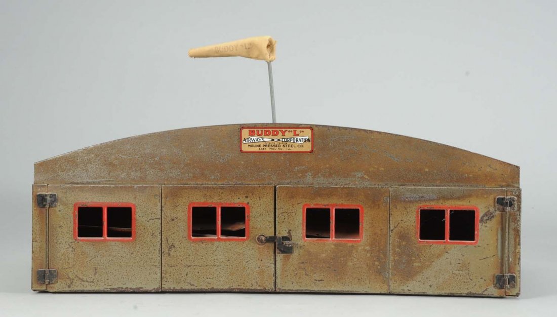 Pressed Steel Buddy L Airways Corporation.: Three plane airport hangar. Includes three original Buddy L planes. Some corrosion and scratching throughout. Significant chipping to decals. Condition (Good - Very Good). Size 20" L.