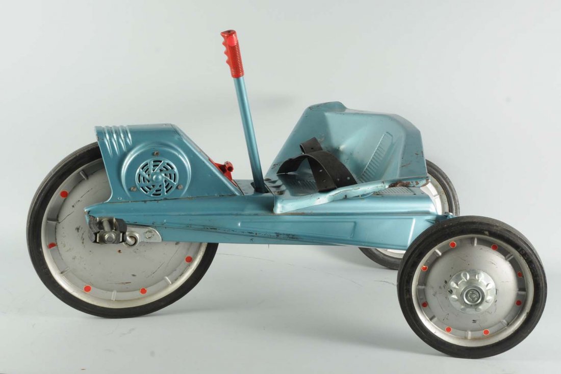 Pressed Steel Mattel V-Rroom X-15 Pedal Vehicle.: Decals on both sides of front. Operated with stick steering and pedals. Seatbelt marked 'Mattel'. Used. All original. Condition (Very Good).