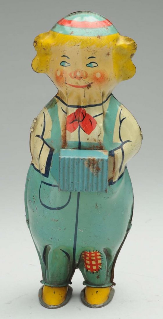 Tin Litho Marx Wind-Up Dancing Toy.: Early version of Betty toy. When in operation, toy waddles back and forth. Some pitting to front of accordion, and general over-all scratching and wear. Condition (Very Good). Size 8" T.