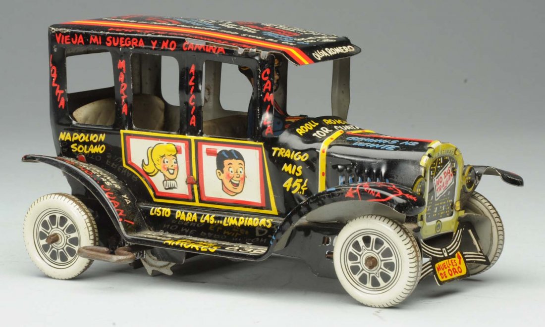 Marx Tin Wind-Up Mexican Archie Car.: All original. Excellent color and gloss throughout. Scarce toy. Condition (Very Good - Excellent) Size 7" L.
