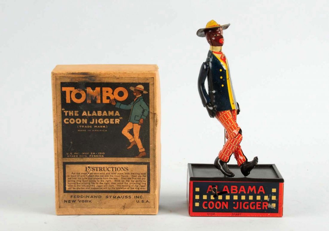 Strauss Tin Litho Tombo Roof Dancing Toy.: The toy comes with the original box, and the box has some tearing and creasing. Toy has minor wear with some scratching on base and has the original arms and hat. The dancing floor is nice. Condition 