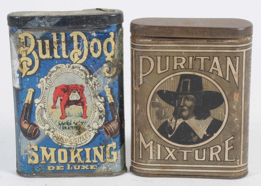 Lot of 2: Vertical Pocket Tins.: Includes a Puritan Mixture which is a paper label with modest amounts of wear. Also includes a Bulldog vertical pocket tin which has scattered overall wear, but still displays well. Condition (Very Go