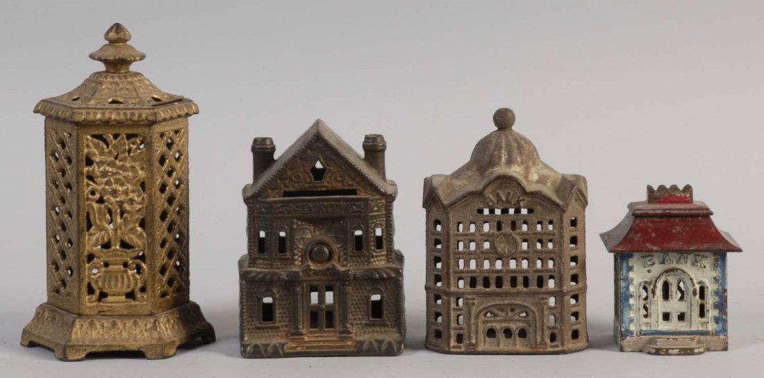 Lot of 4: Cast Iron Still Banks.: They all have some paint scratches throughout. The banks are painted in various colors: bronze, brown, white, and red. They are preserved very well. Condition (Good - Excellent). Size Largest: 7" L.