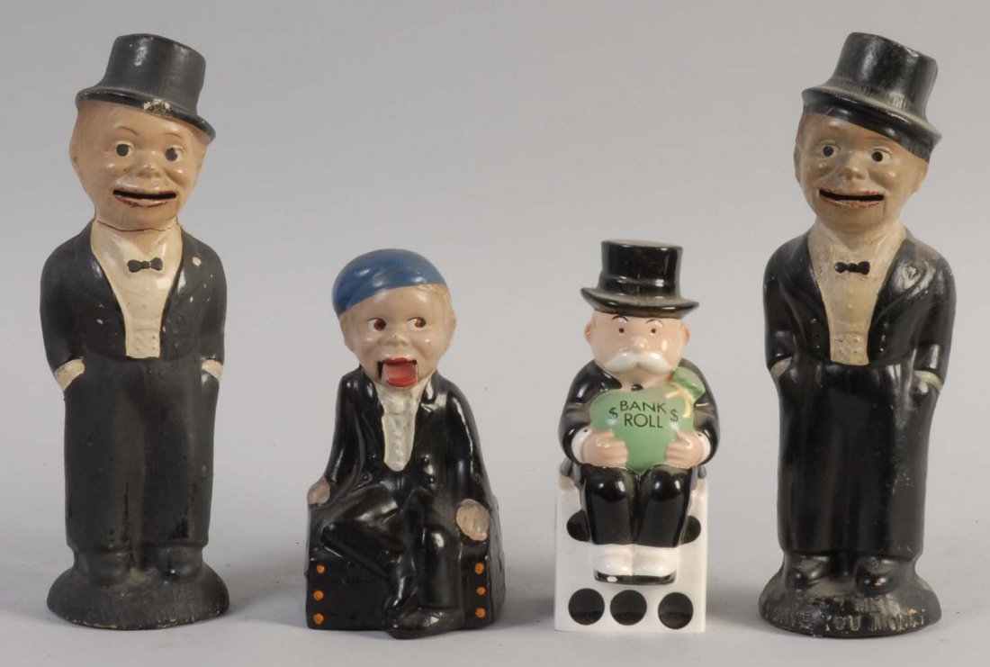 Lot of 4: Charlie McCarthy Still Banks.: All banks have minor paint chips throughout. They all are painted in various colors: black, tan, white, and green. Their faces are very expressive, and the banks are preserved very well. Condition (Ve