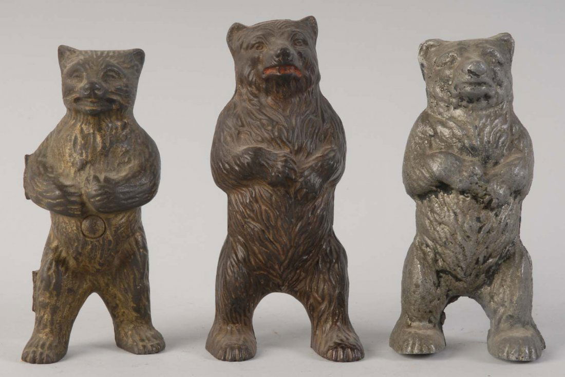 Lot of 3: Cast Iron Standing Bear Still Banks.: All banks are painted in nice brown, yellow, and silver colors. Their faces are very expressive. The banks are preserved well. Condition (Very Good). Size 7 " T.