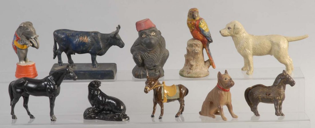 Large Lot of Animal Still Banks.: Cast iron. Some of the banks have minor scratches throughout. They are painted in beautiful and bright grey, orange, white, and blue colors. The banks are well preserved. Condition (Good). Size Larges