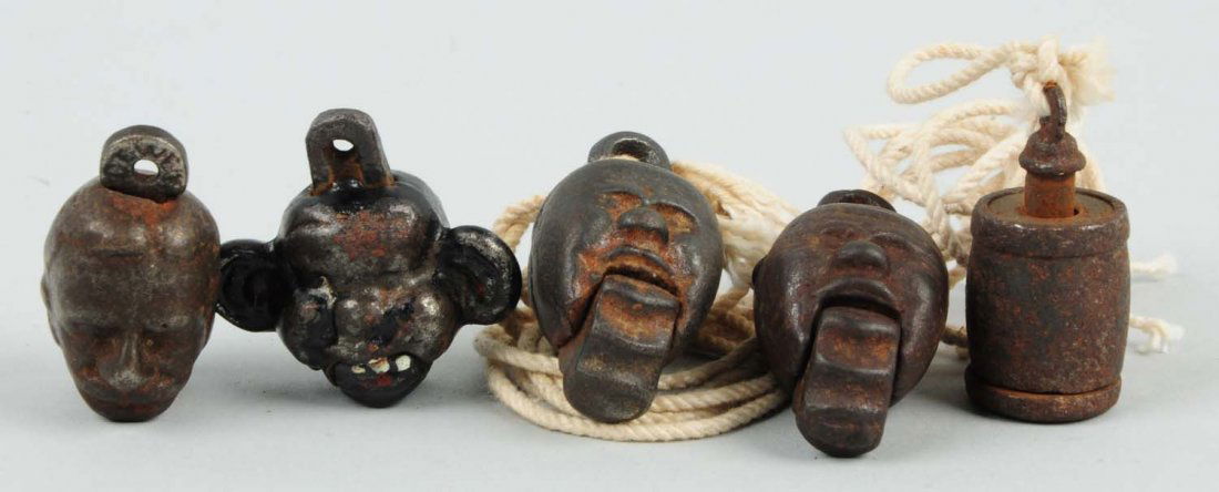 Lot of Cap Bombs.: Lot includes the yellow kid, Admiral Dewey, two men, and a barrel. One of the men's lower jaw is missing. All cap bombs have some scratches and paint loss. The men's faces are very expressive. It is a