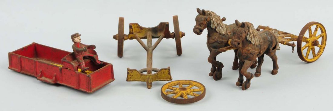 Horse & Carriage.: Lot includes the rider, two horses, and two ladders. One of the carriage's wheels is detached but present. There is significant paint loss throughout. The horses and carriage are painted in red, yello