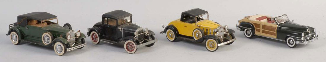 Lot Of Old Time Cars.: The lot includes three diecast Hubley cars and one Franklin Mint Chrysler Town and Country with the only styrofoam portion of the original box. There are some minor scratches and dusting to the Hubley