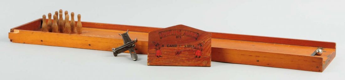 Wooden Bowling Alley Game.: The game is made by Arcade Toys. It has some wooden parts chipped, broken, and glued together. The game comes with the steel mechanism one metal ball, and ten wooden bowling pins. Also, the game comes