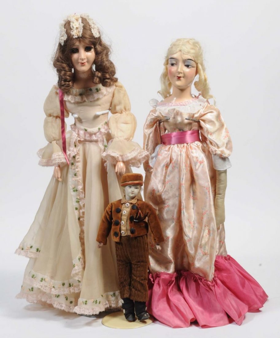 Lot of 3: Dolls.: Includes two Boudior/Bed dolls and a small boy papier mache doll. The boy doll has damage on his face. Condition (Fair). Size Largest: 25" T.