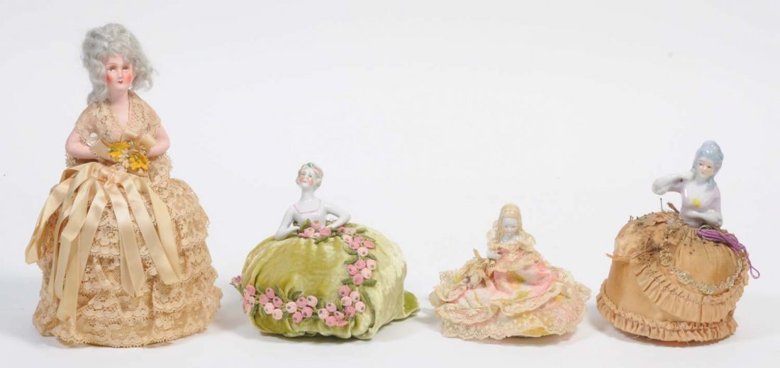 Lot of 4: Vintage Pincushion Half Dolls.: The largest doll is papier mache. The other three are china dolls with no repairs. Condition (Very Good). Size Largest: 10" T.
