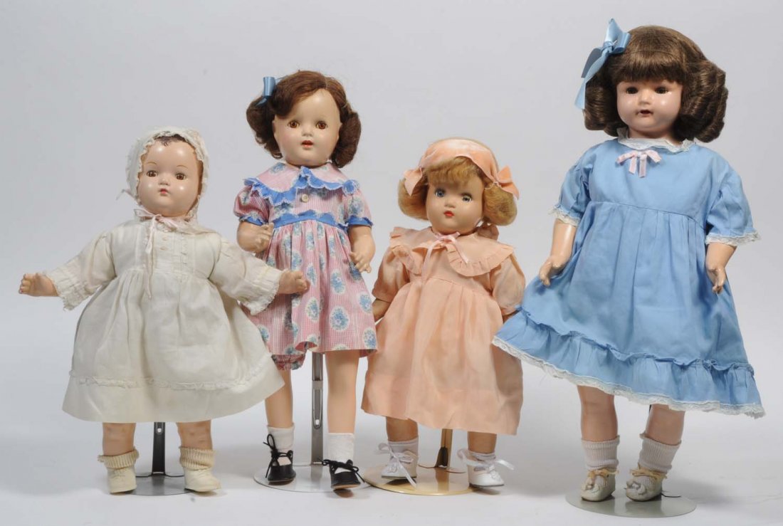 Lot of 4: Composition Dolls on Cloth Bodies.: The largest of the dolls is an Effanbee "Rose Marie" and has been repainted and rewigged. Two are unmarked and baby is marked "ABC". All dolls are in vintage clothing with light crazing. Condition (Go