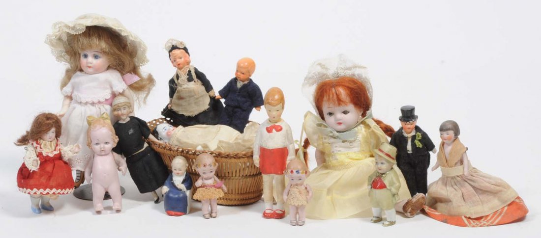 Lot of 15: Small German Vintage Dolls.: Mostly all bisque. Includes a Frozen Charlotte, Nodders, and a doll house. Some have glass eyes and some have their original clothing. This is a really sweet lot. Condition (Good). Size Largest: 6" T.
