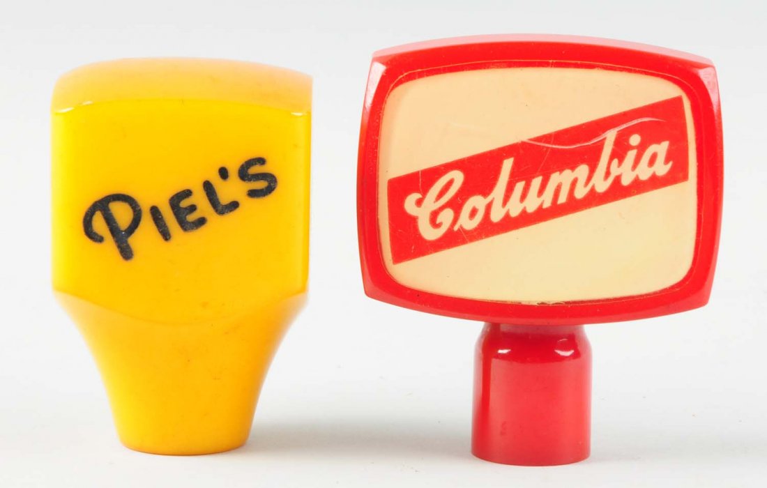 Lot of 2: Beer Taps.: Includes a Columbia tap and a Piel's tap. Condition (Very Good). Size Each: 3" L.