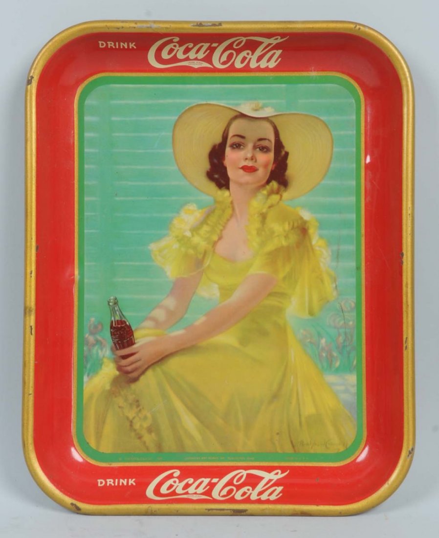Coca-Cola Serving Tray.: This 1940s serving tray has some chipping and rubs to the rim. Condition (Very Good). Size 13" L.