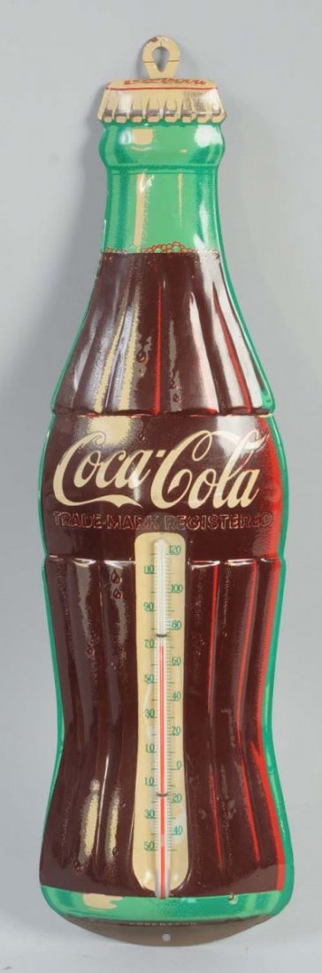 Coca-Cola Bottle Shaped Thermometer.: This 1950s era small Coca-Cola bottle shaped thermometer was manufactured by Robertson. Only a few small scratches around the top hole. Condition (Excellent). Size 17" L.