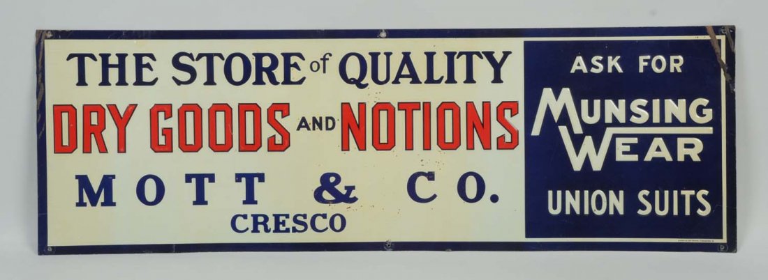 1910-1920 Munsingware Embossed Tin Sign.: Some surface flaking and left edge corner bends. Condition (Very Good). Size 36" L .