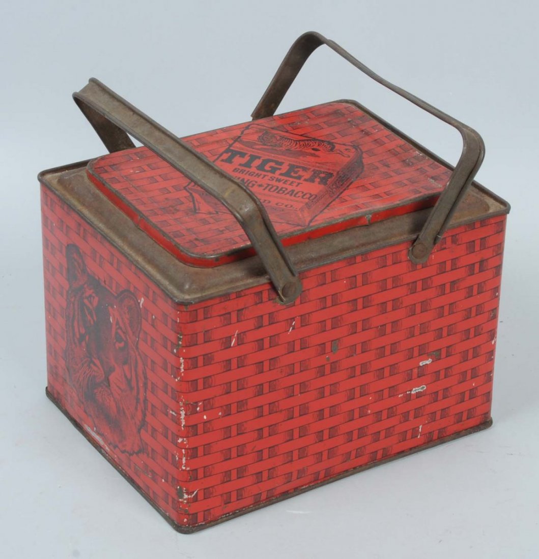 Tiger Tobacco Tin.: A few dents, scratches, and paint chips with light wear. Condition (Very Good). Size 8" L .