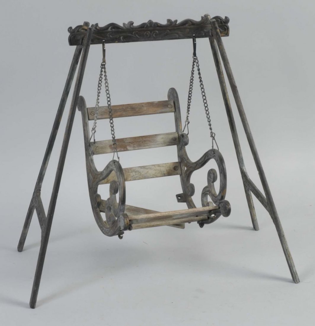 Cast Iron Swing with Wooden Slats.