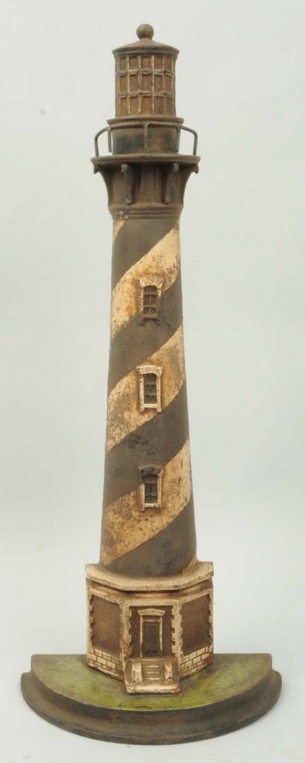 Cast Iron Oversized Lighthouse Doorstop.: Contemporary. Condition (Good). Size 21 - 1/2" T.