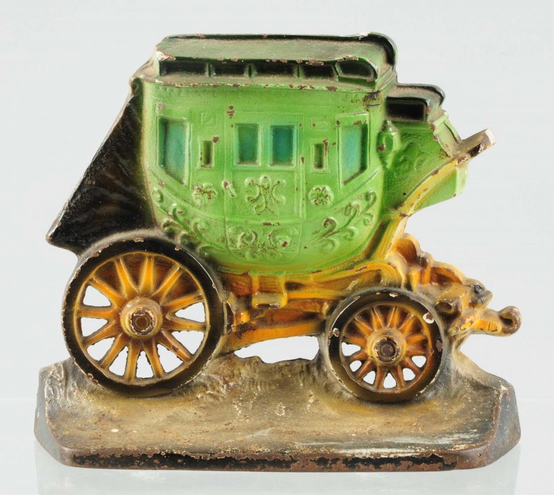 Cast Iron Stage Coach Doorstop.: Made by Creations Co. Marked, "Copyright 1930, C. Co." Condition (Very Good). Size 7 - 1/2" T.