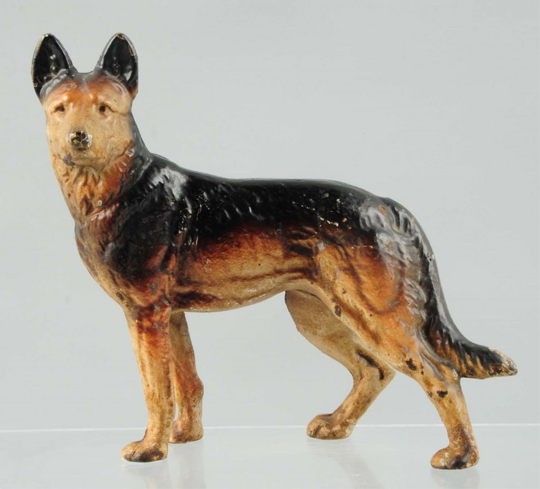Cast Iron German Shepherd Dog Doorstop.: Facing left, full-figure. Condition (Excellent). Size 9" T.