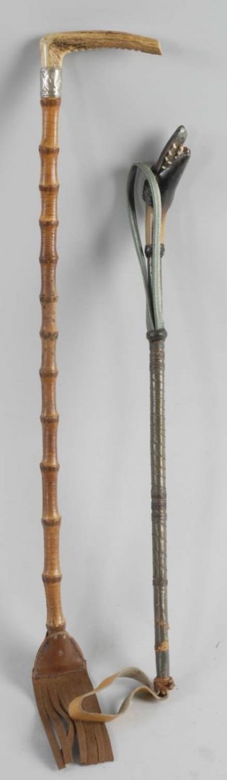 Lot of 2: Riding Crop Canes.: One has a Stag handle with engraved nickel silver collar mounted on a fine whangee bamboo shaft. Circa 1920. The other has a Carved Horn Handle Dog's Head with teeth. Has a concealed steel probe or da