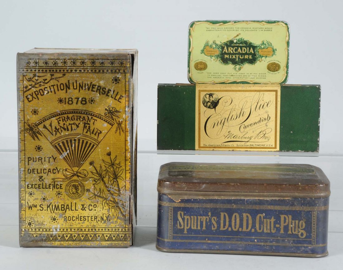 Lot of 4 Vintage Tobacco Tins.: Vanity Fair upright (Wm. S. Kimball), Fragrant, D.O D Cut Plug (ripped paper label) and English Slice Cavendish (Marburg Bros. Tob. Co.), and Arcadia Mixture (Surburg Co.). Condition (Good Plus). Size