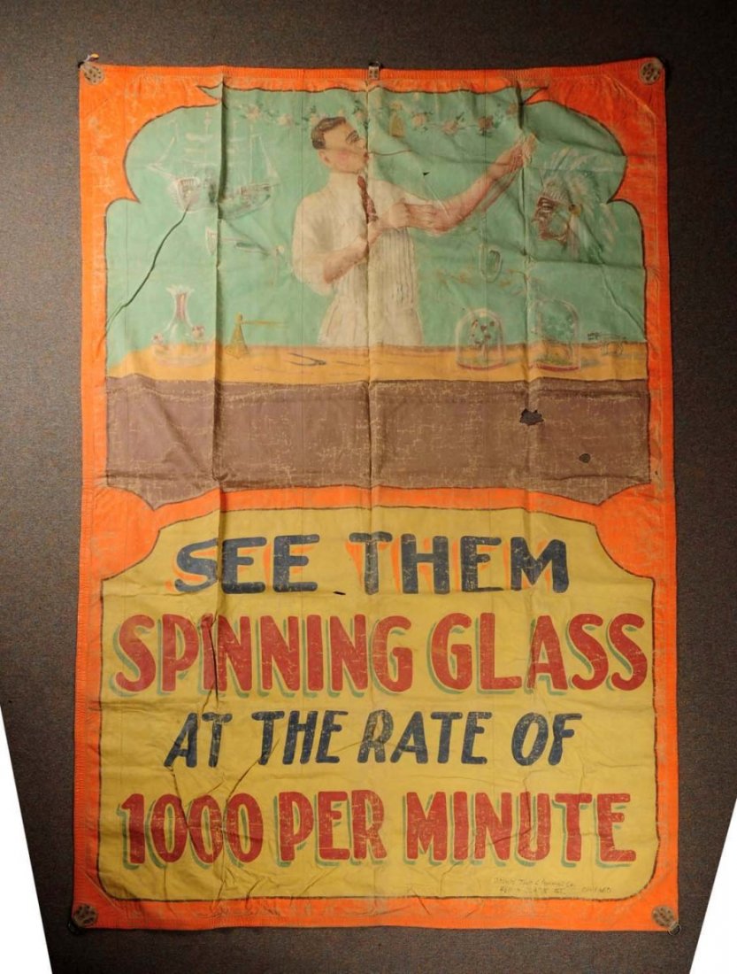 Lot of 2: Large Sideshow Canvas Banners.: 1915-20 and good quality art. The Ostrich Man is by O’Henry Tent and Awning Co. and has soiling, wear. A few tears and some stitched repair. The Spinning Glass banner is by same maker with wear, soi