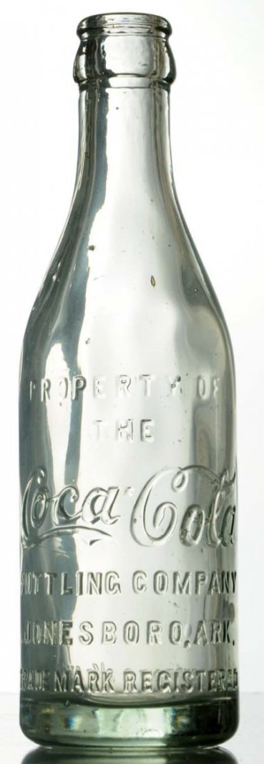 Jonesboro, Arkansas Coca-Cola Bottle.: Almost no wear and a tiny nick. Condition (Near Mint). Size 7 - 3/4" T.