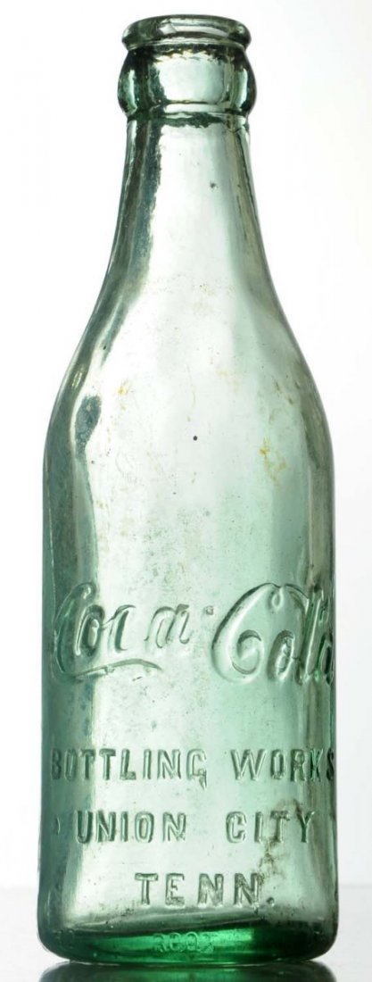Union City, Tennessee Coca-Cola Bottle.: Light soilng and small lip chip. Condition (Excellent). Size 7 - 1/2" T.