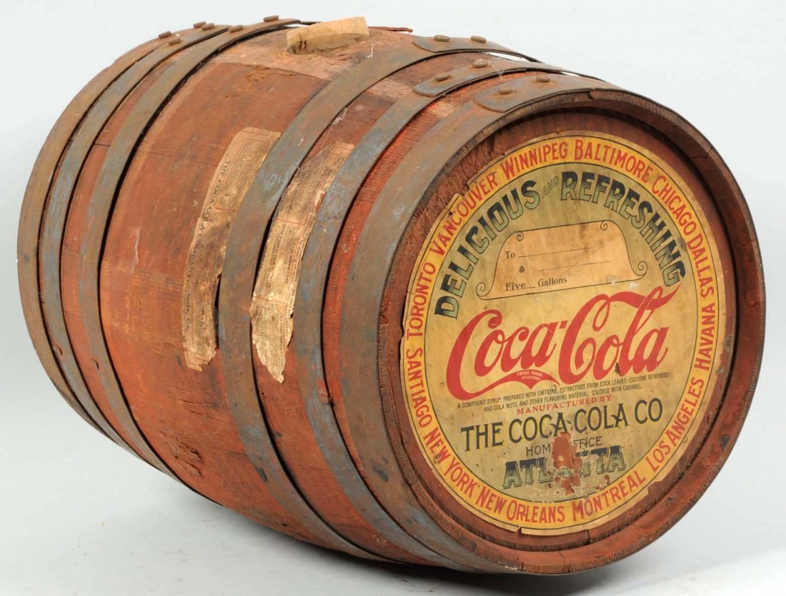 1920s Coca-Cola 5 Gallon Syrup Barrel.: Very strong paper label remaining with only some wrinkles and a few small paper chips. Condition (Very Good - Excellent). Size 16" L.