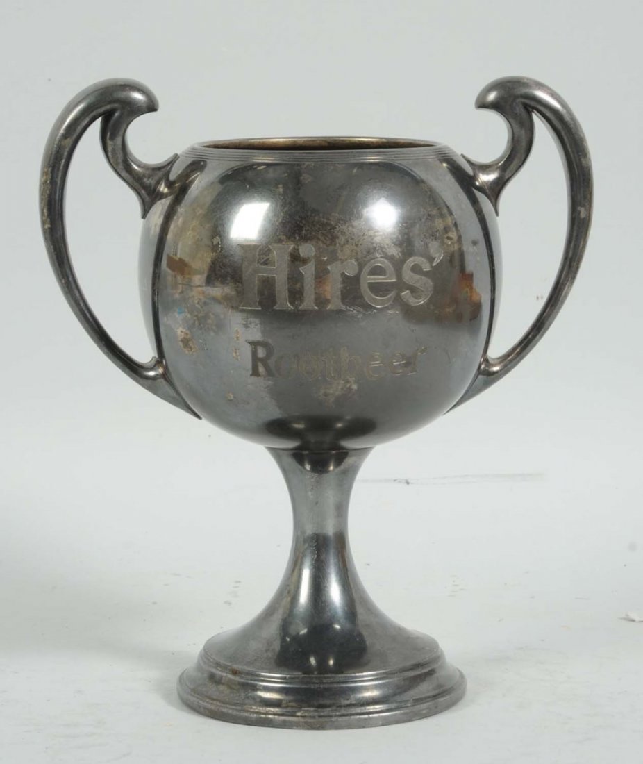 Hires Root Beer Trophy.: This silver plated trophy depicts the ugly kid on one side and the text "Hires Root Beer" on the other. Overall, nice condition. Condition (Very Good). Size 9 -1/2" T.
