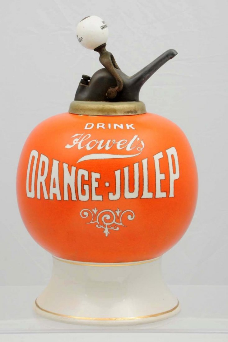 Howell’s Orange-Julep Ceramic Syrup Dispenser.: Includes its original marked ball pump. Color tone is strong and above average for one of these. Expert repair on the base covering at least a hairline. Displays very well! Condition (Excellent).