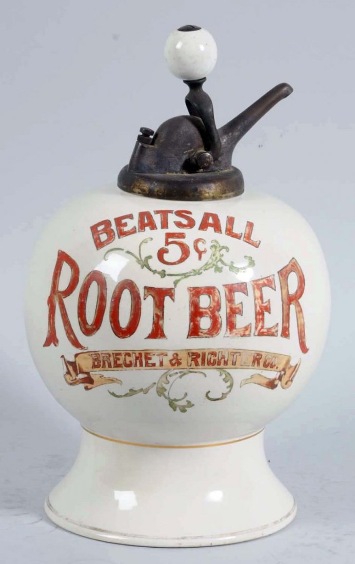 Beats All Root Beer Ceramic Syrup Dispenser.: Circa 1920. Includes and original ball pump. Displays very well with some overall surface wear impacting the coloring on the lettering and decoration. Also has high quality repair on what was once a c