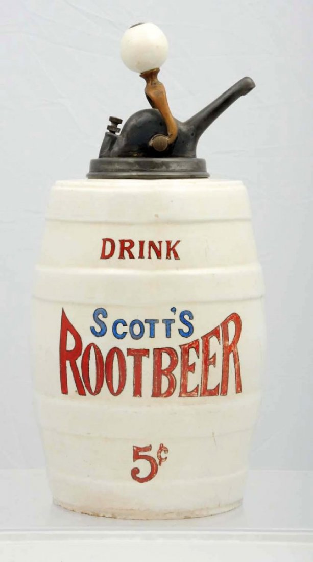 Scott’s Root Beer Barrel Syrup Dispenser.: Comes with an old ball pump. A repaired lip chip is concealed by the pump, with light wear, soiling, and a few small base edge nicks. Gold banding is worn away. Condition (Very Good).