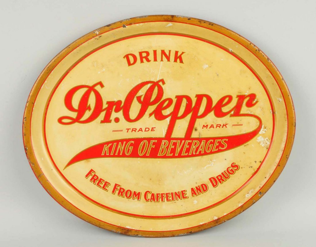 1900-05 Dr. Pepper Large Oval Tin Serving Tray.: Medium stains and wear with a few shallow dents and numerous rim nicks. Condition (Very Good). Size 16 - 1/2" L.
