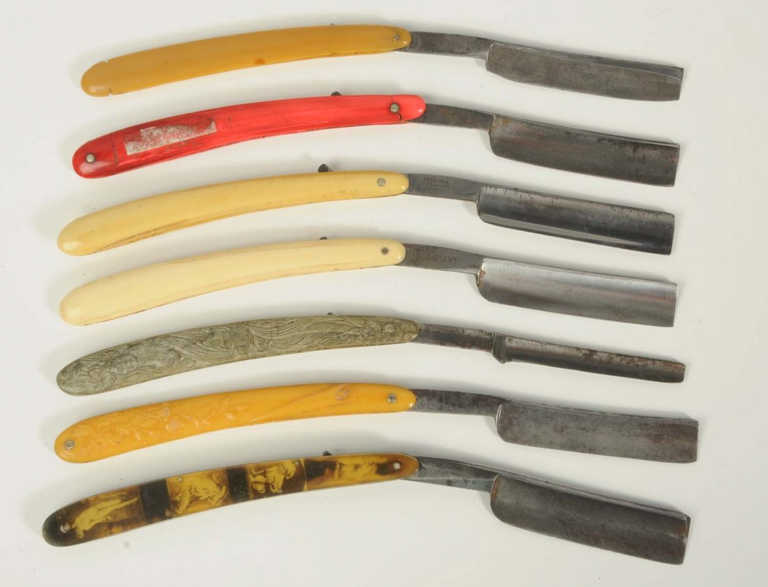 Lot of 7: Celluloid Razors.: Novelty Cutlery with picture celluloid handles reading “Andrew Buote, Chisholms Mills, Me.” photos of man & woman, reverse with three nudes and child on chamber pot, photos with fading and stainin