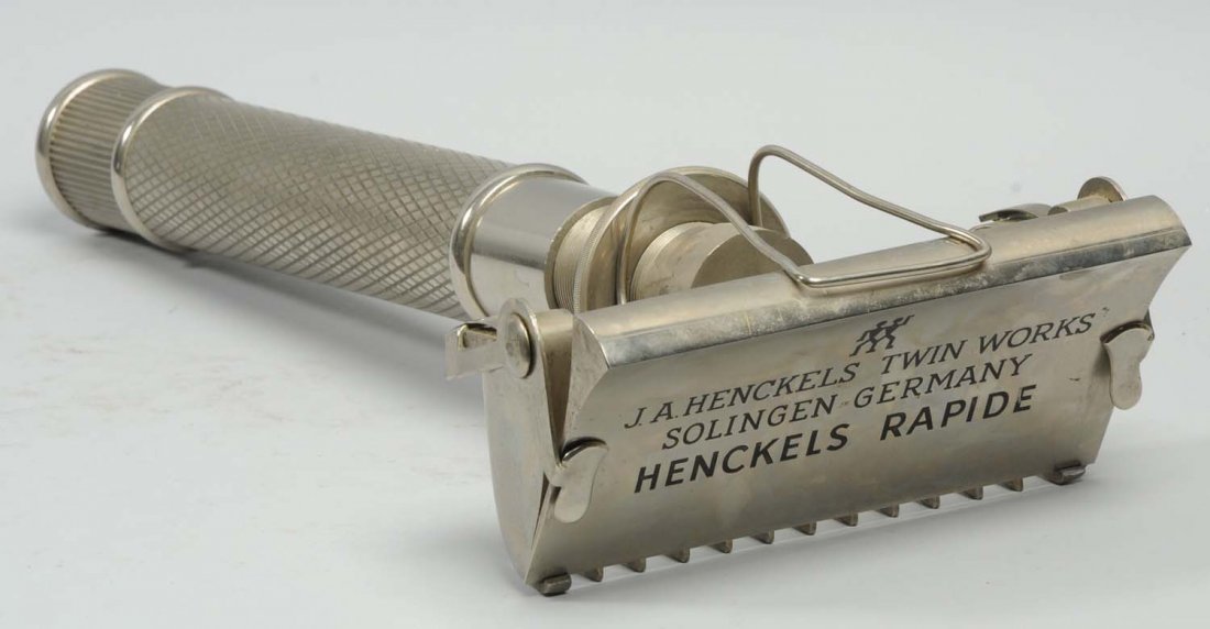J.A. Henckel's Twin Works Display Razor.: This is a fantastic display razor Henckels. Made of heavy chrome. Perfect detail. Circa 1920's. Rare. Condition (Near Mint). Size 27" L.