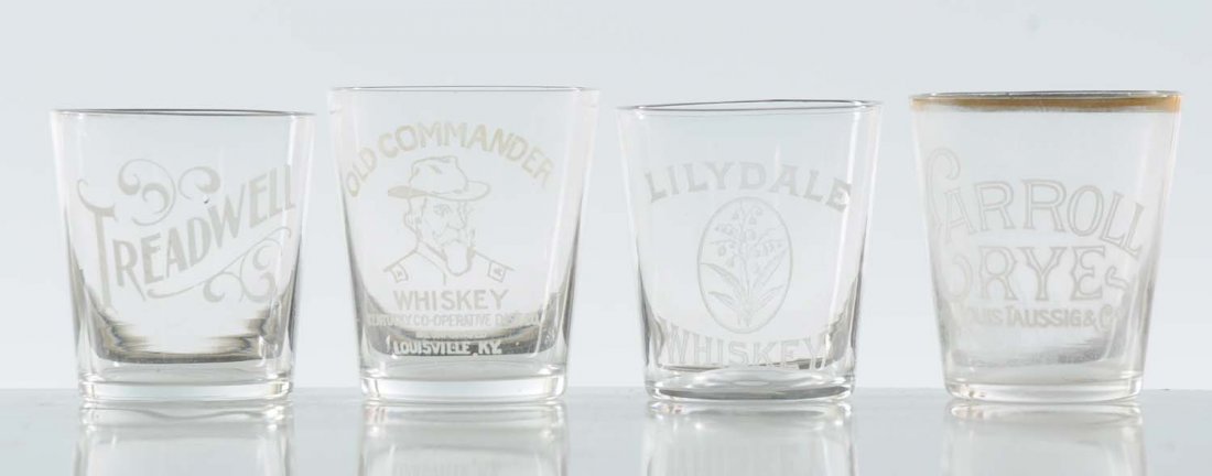 Lot of 4: Acid Etched Shot Glasses.: Lot includes: Treadwell, Old Commander Whiskey, Lilydale Whiskey, and Carroll Rye. All four are clean with no chips or cracks. Condition (Excellent). Size Each: 2" L.
