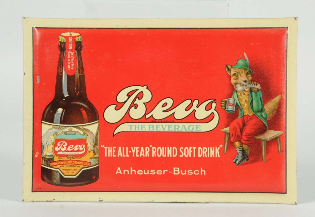 Anheuser-Busch Bevo Tin Over Cardboard Fox Sign.: "The All Year 'Round Soft Drink" sign is a very rare and hard-to-find sign. It has some minor scratching but displays very well. Sign has the original hang string on the back. Condition (Very Good - E