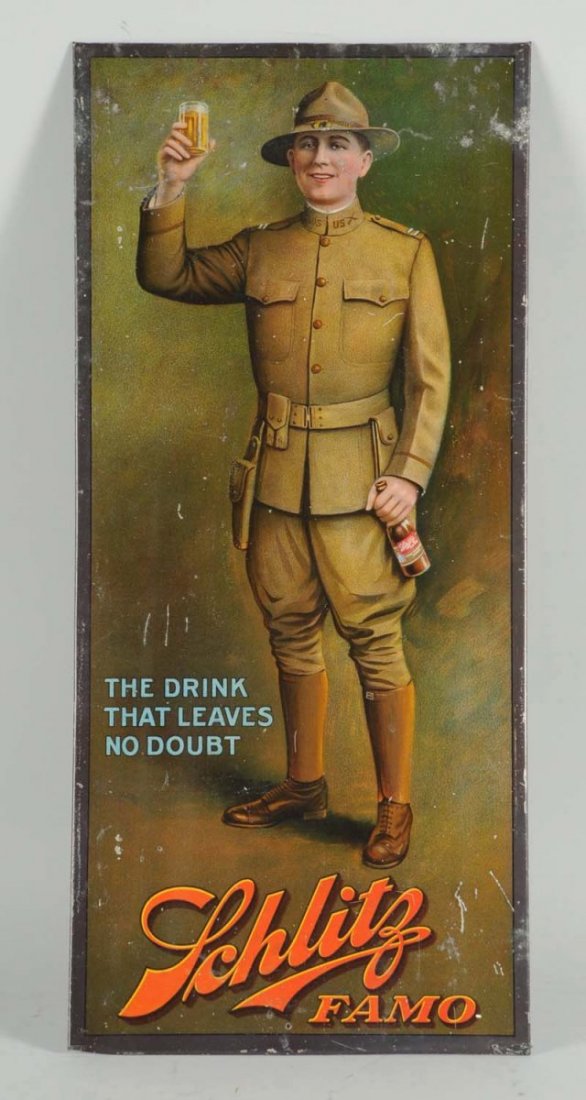 Schlitz Famo Tin Over Cardboard Soldier Sign.: "The Drink That Leaves No Doubt" sign depicts a United States soldier and is a hard-to-find sign. It has wear and scratching throughout, and one nail hole in the bottom edge. Condition (Very Good). Si