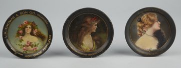 Lot Of 3 Small Round Tin Advertising Tip Trays.: Lot Of 3 Small Round Tin Advertising Tip Trays: 1 Compliments Christian Feigenspan Breweries, Newark, NJ P.O.N., The Meek Co. Coshocton, O. featuring lady w/ ribbon in long hair, 1 I.P. Thomas & Son C