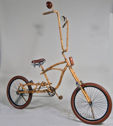 Custom Single-Speed Bamboo Tiki Cruiser Bike.: Custom Single-Speed Bamboo Tiki Cruiser Bicycle w/Small Tiki Carving On Front, 2 Working Front Lights & 1 Red Rear Light, Coconut Mirrors On Ape Hanger Handlebars, 26” Brown Schwalbe “Fat Frank”