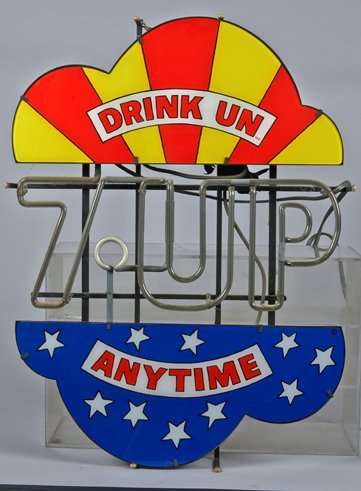 7 Up “Drink Un Anytime” Plastic Light-Up Sign w/ Neon.: 7 Up “Drink Un Anytime” Plastic Light-Up Sign w/ “7 Up” Neon Sign On Metal Frame 2’ 9” x 2’ 1”.