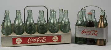 Lot Of 2 Coca Cola Bottle Carriers w/ Glass Coca Cola.: Lot Of 2 Coca Cola Bottle Carriers w/ Glass Coca Cola Bottles c1930s-40s, Metal w/ wire handles: 1- Holds 6 bottles & 1- Holds 12 bottles.