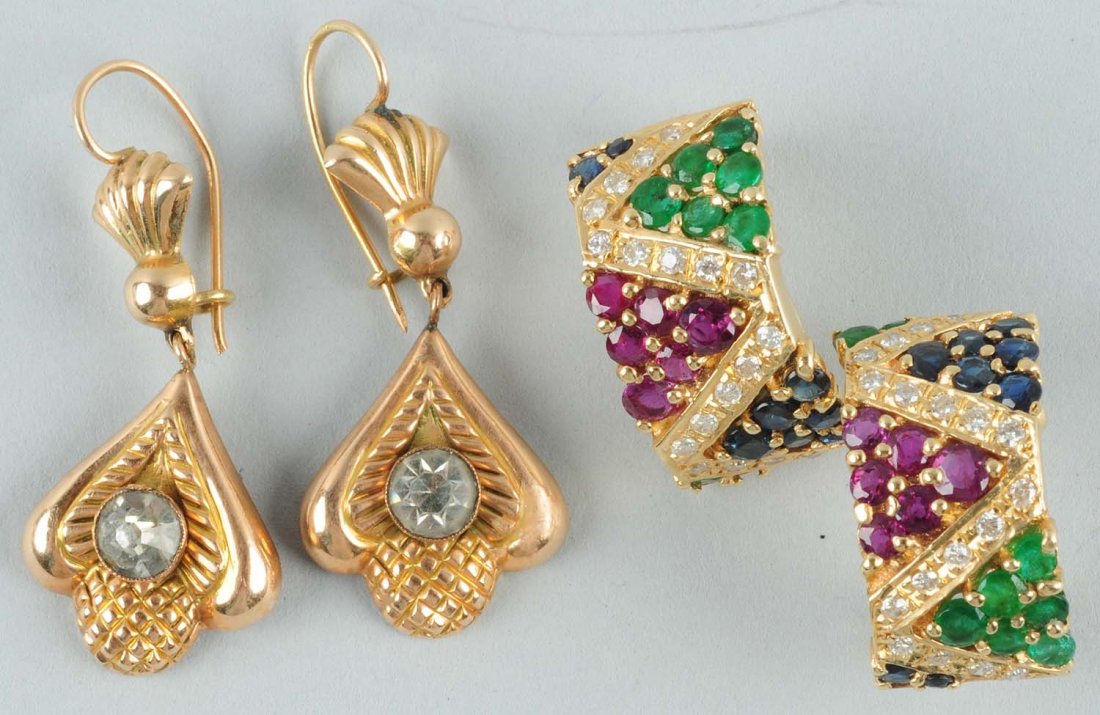 Lot of 2: Ladies Earrings.: First pair is 14K yellow gold earrings with simulated diamonds and the weight is 2.0 dwt. Pierced. The second set is 14K yellow gold diamond, ruby, and emerald earrings. Pierced. Their weight is 6.1 d