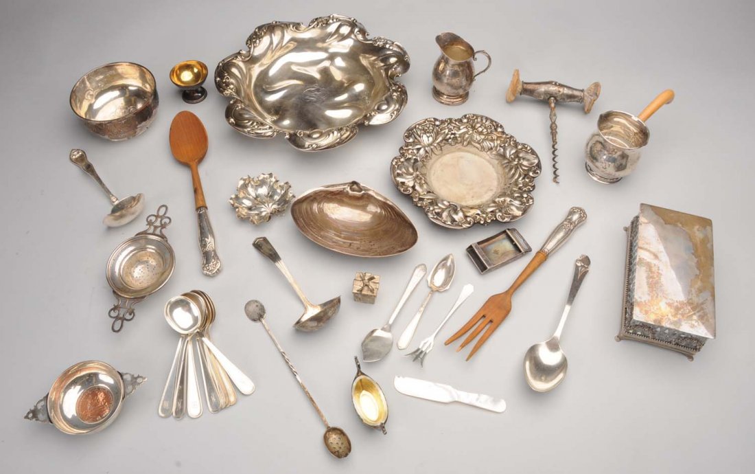 Mixed Group of American Sterling.: Including a Buccellati leaf form dish; a 'gift box' trinket box marked Tiffany; a Gorham dish with a shaped molded scroll and leafage rim; another smaller, similar; a child's bowl, J E Caldwell; a cla